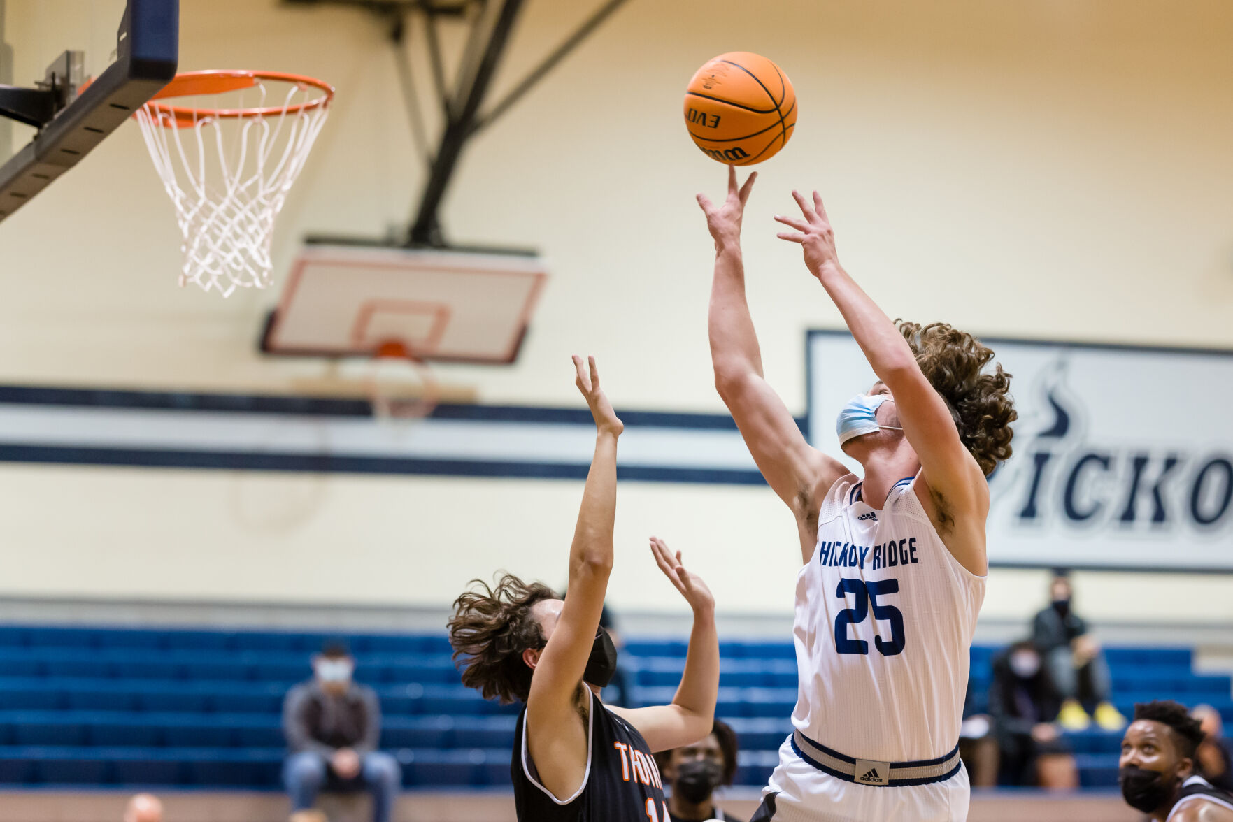 Boys Basketball: Hickory Ridge RaginÕ Bulls defeated the Northwest Cabarrus Trojans 64-56.